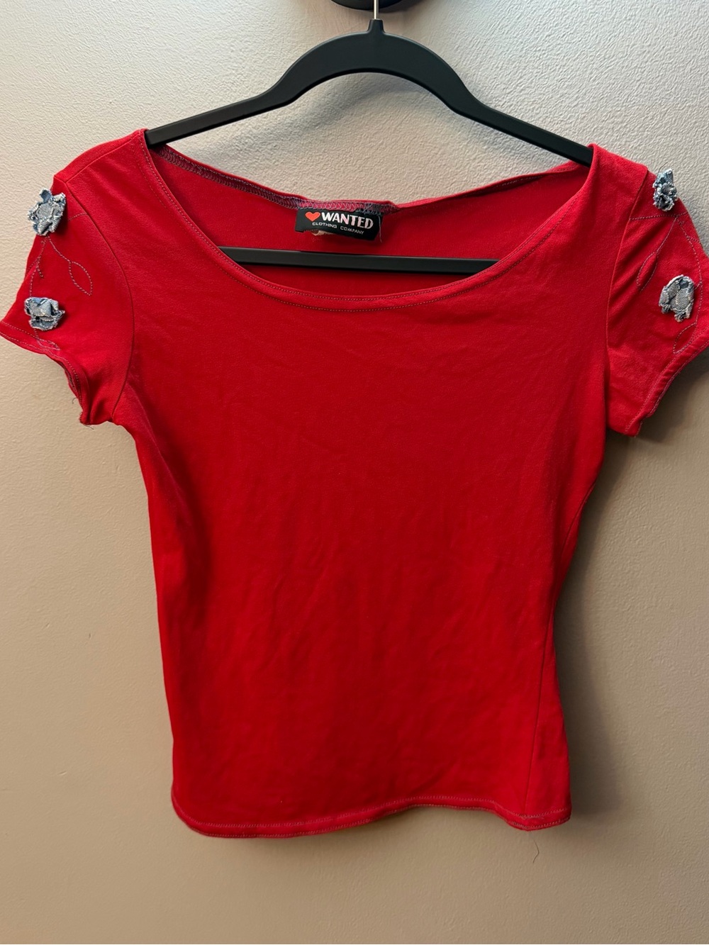 Vintage Y2K WANTED Red Short-Sleeve Scoop Neck Top with Floral Shoulder Accents